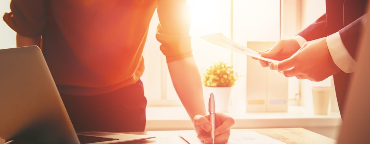 Business-people using a loan checker